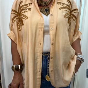 blusa palmeras en naranja